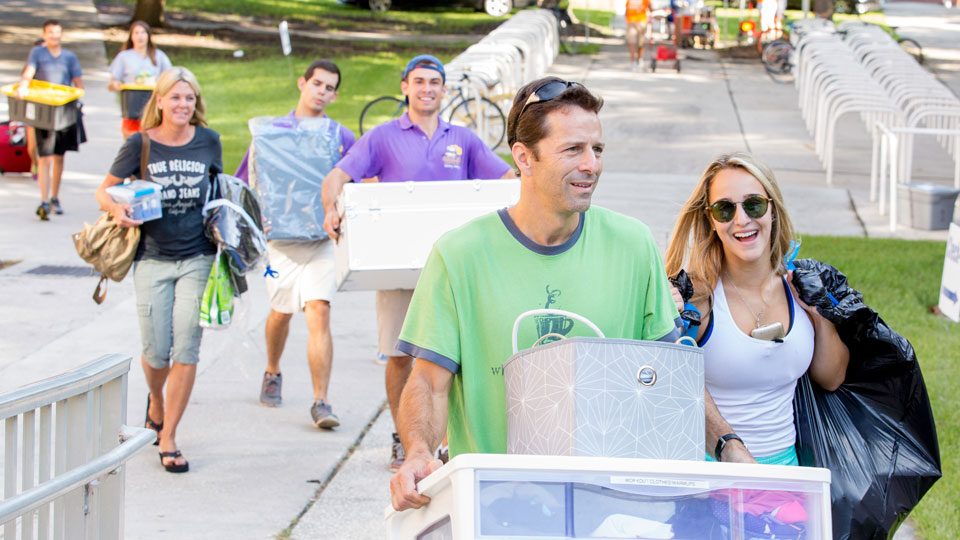 Parents helping students move in
