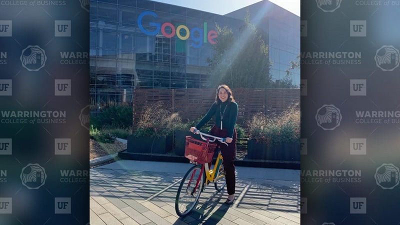 Nelly Wilson on a bike in front of the Google building