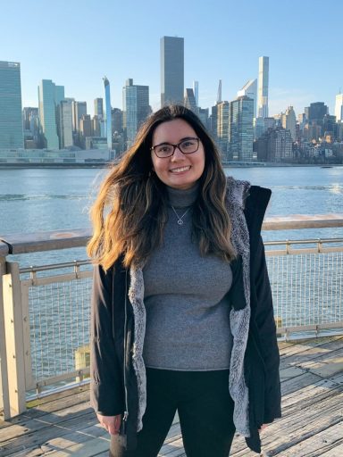 Makayla Ho with the New York City skyscrapers in the background