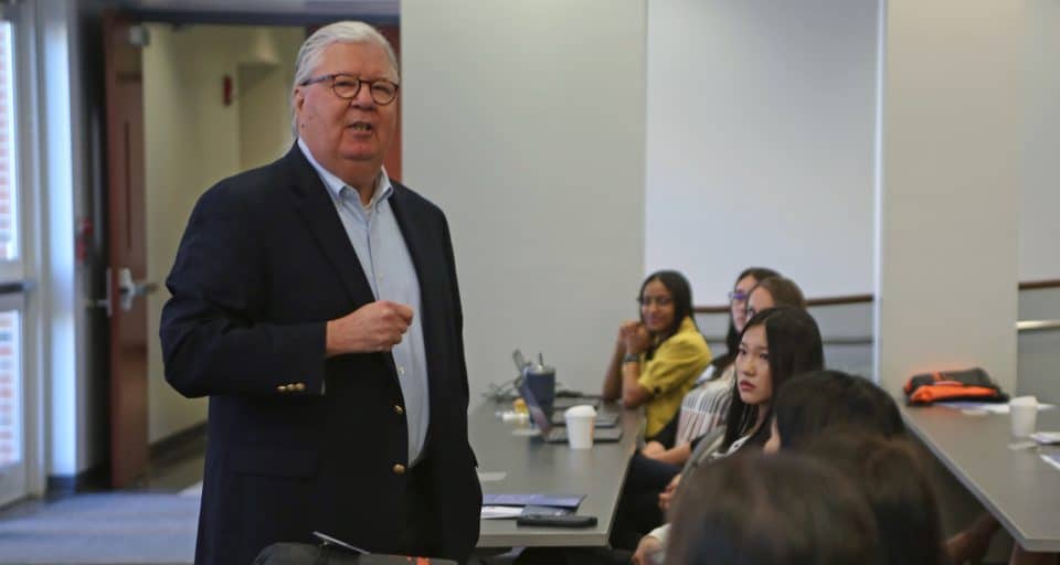 Senior Associate Dean, Gary McGill, speaks to students in a classroom