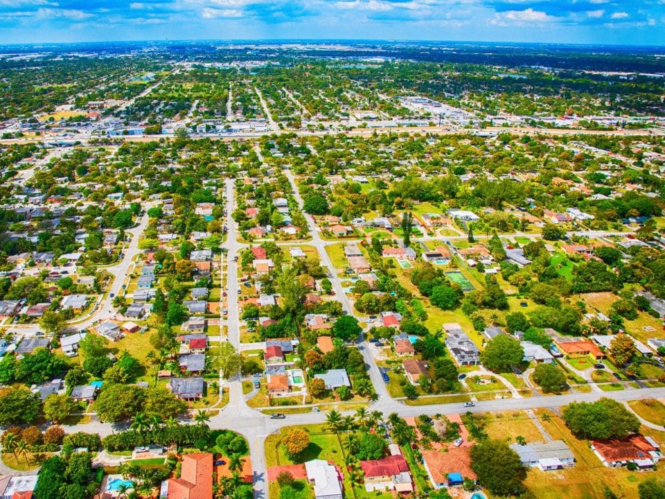 Aerial view of a suburban Miami neighborhood stretching into the horizon