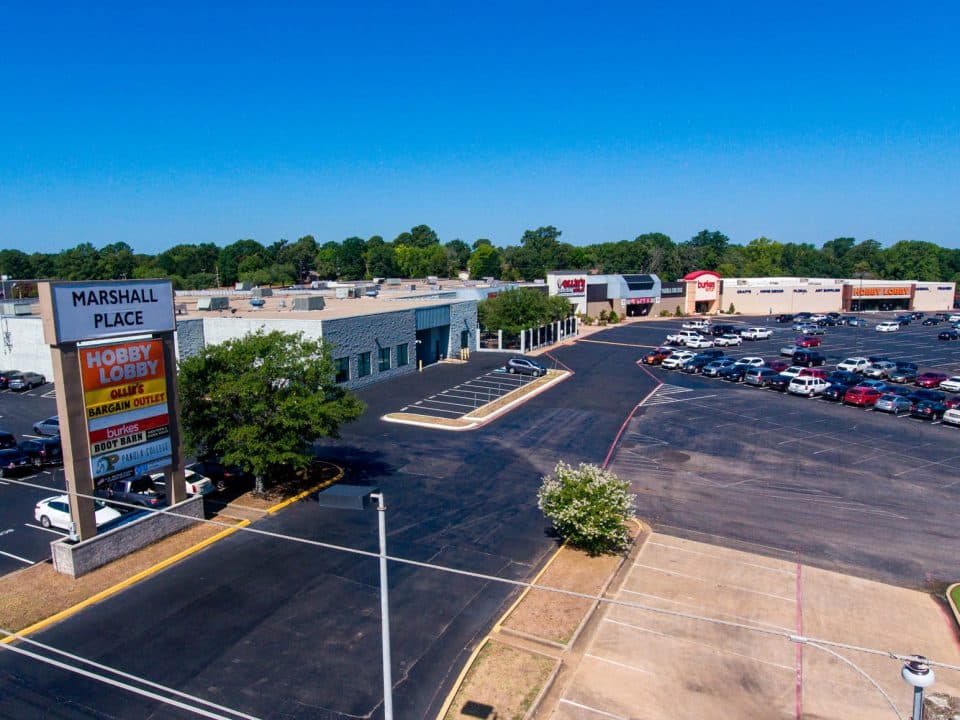 Marshall Place mall housing Hobby Lobby, Ollie's Bargain Outlet, Burkes, Boot Barn, Panola College, and others