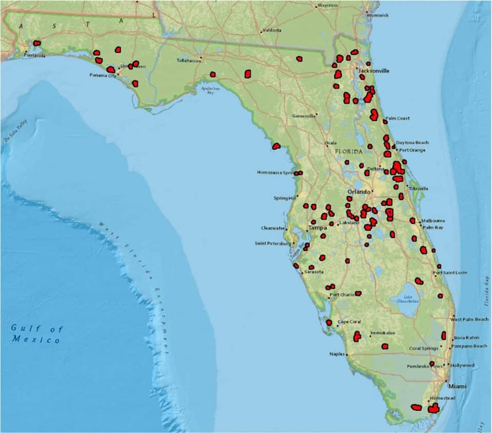 Map of Florida with many small red areas scattered unevenly across the state