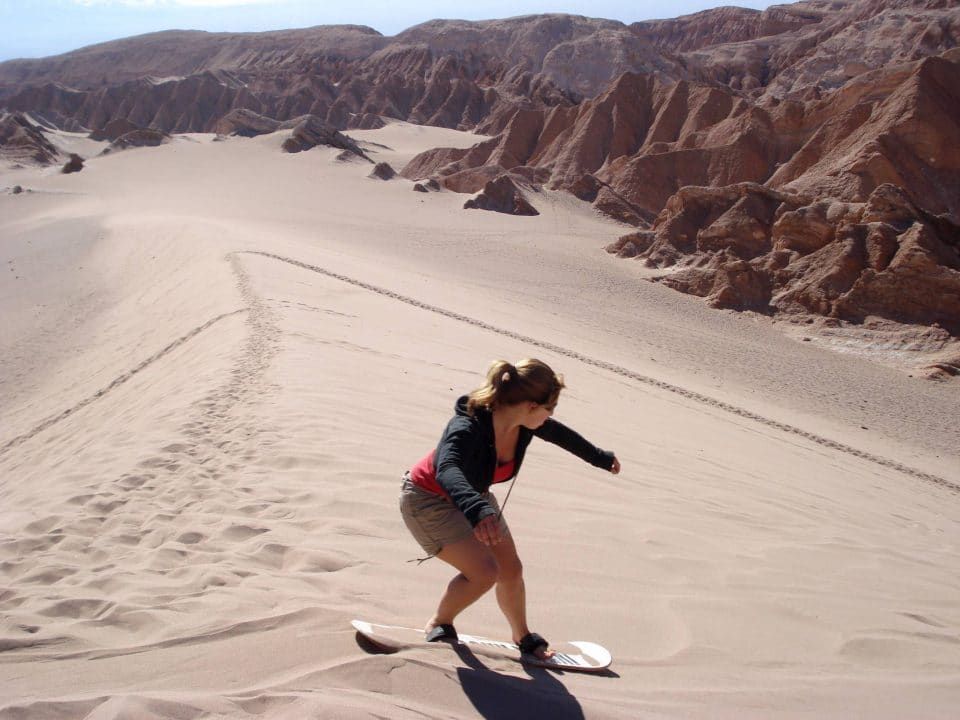 Sand boarding in the dunes of Chile