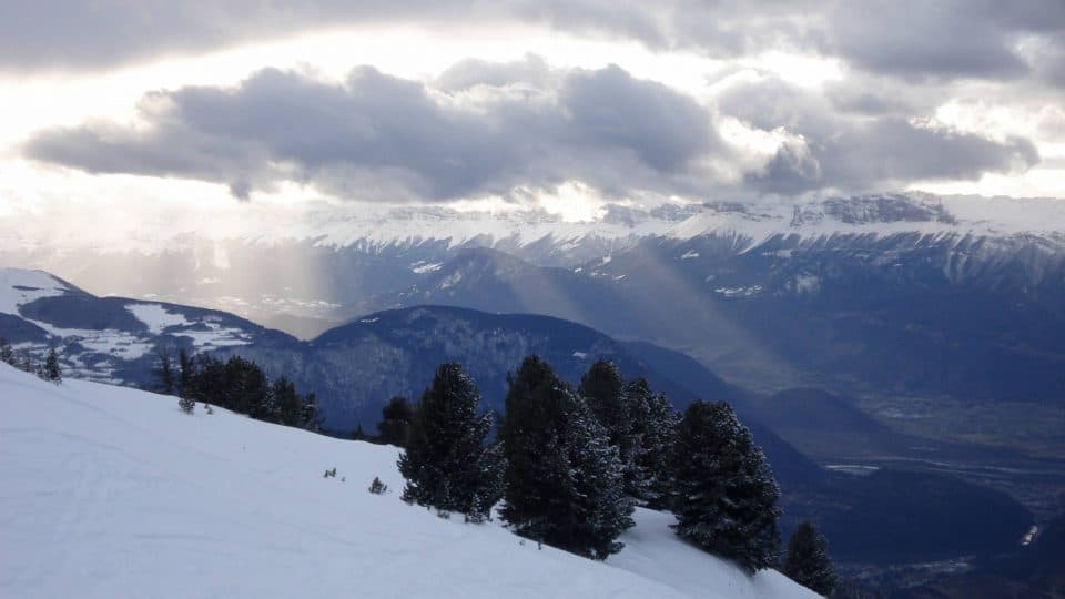 Sun rays through the clouds in the French Alps