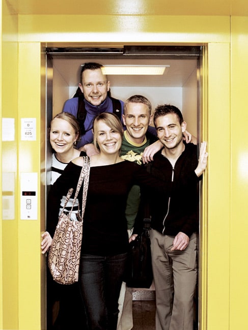 Students in an elevator at Aarhus University in Denmark