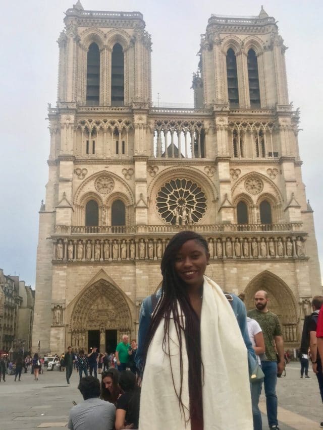 Student in front of Notre Dame in Paris, France