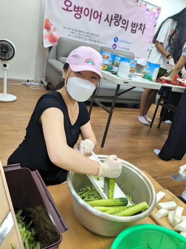 Student, Susie, shredding cucumbers in South Korea